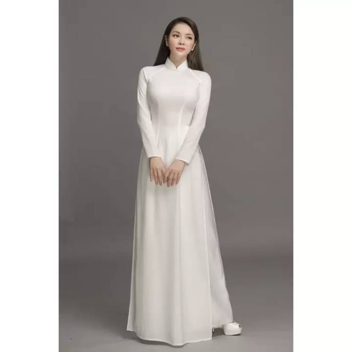 Dáng áo dài tà rộng tông trắng nhẹ nhàng, trang nhã