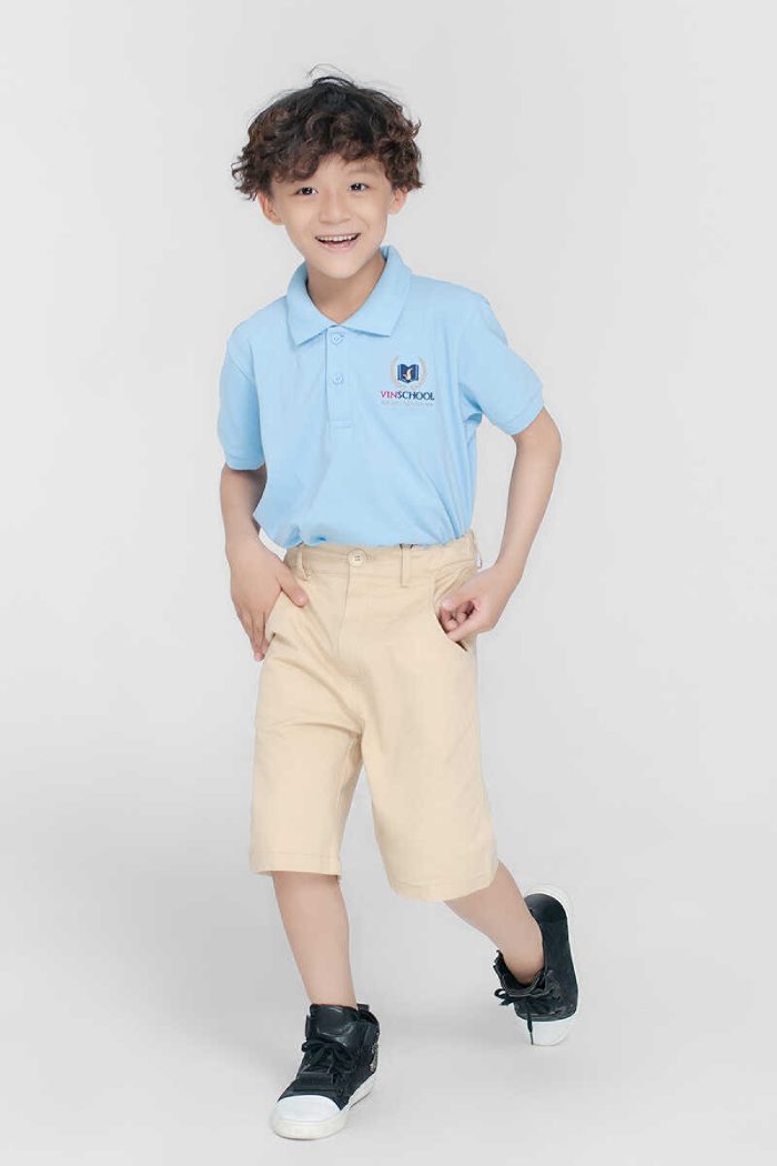 Mẫu áo học sinh cấp 1 Vinschool với tông màu xanh