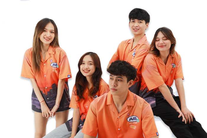 Mẫu áo đồng phục lớp có cổ đẹp, tông màu cam rực rỡ